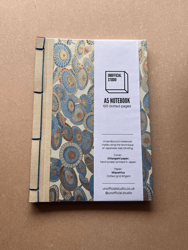 A5 Notebook — Gold umbrellas — Plain 90gsm paper